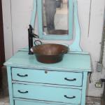 Washstand with small pump and basin attached 